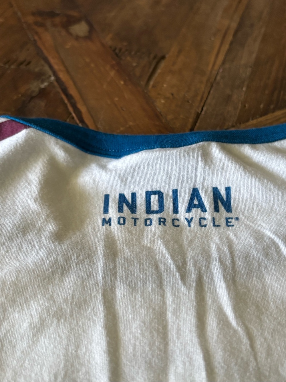 Indian Motorcycle Women’s White Logo Tee with Blue & Maroon Striped Accents - Picture 4 of 8
